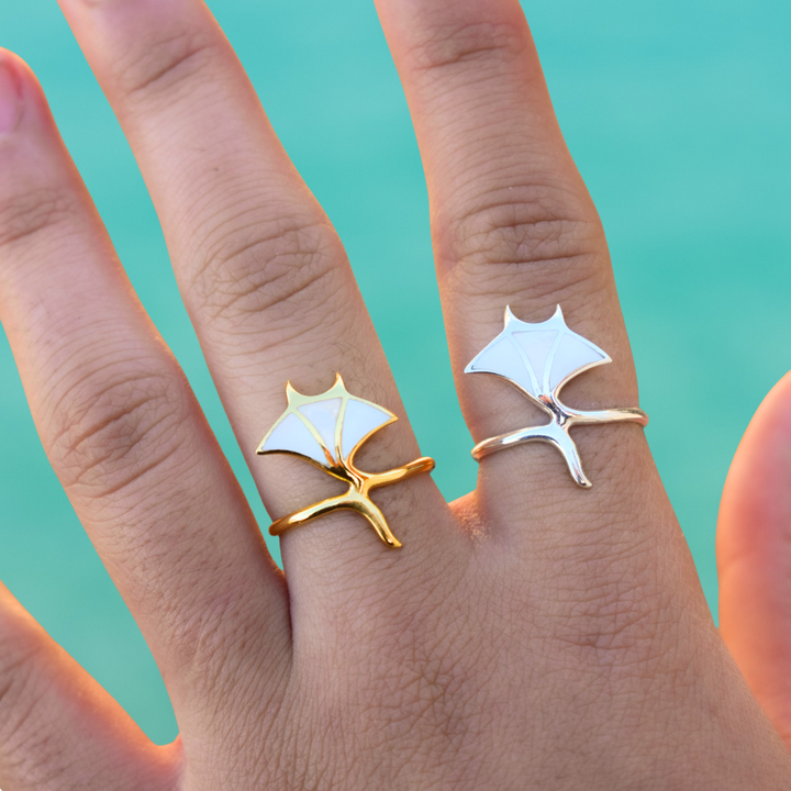 Gold and silver manta ray ring with shimmering mother of pearl stone, ocean-inspired jewellery for everyday wear.