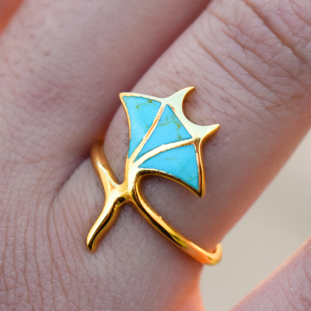 Gold manta ray ring with turquoise inlay, waterproof ocean-inspired jewellery design.