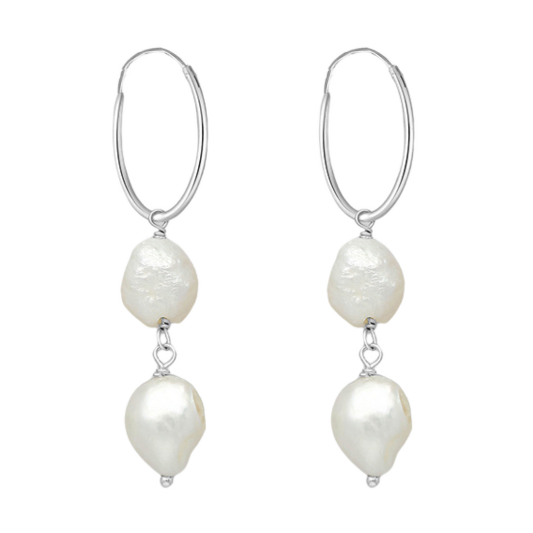 Sterling silver hoop earrings with freshwater pearls on white background