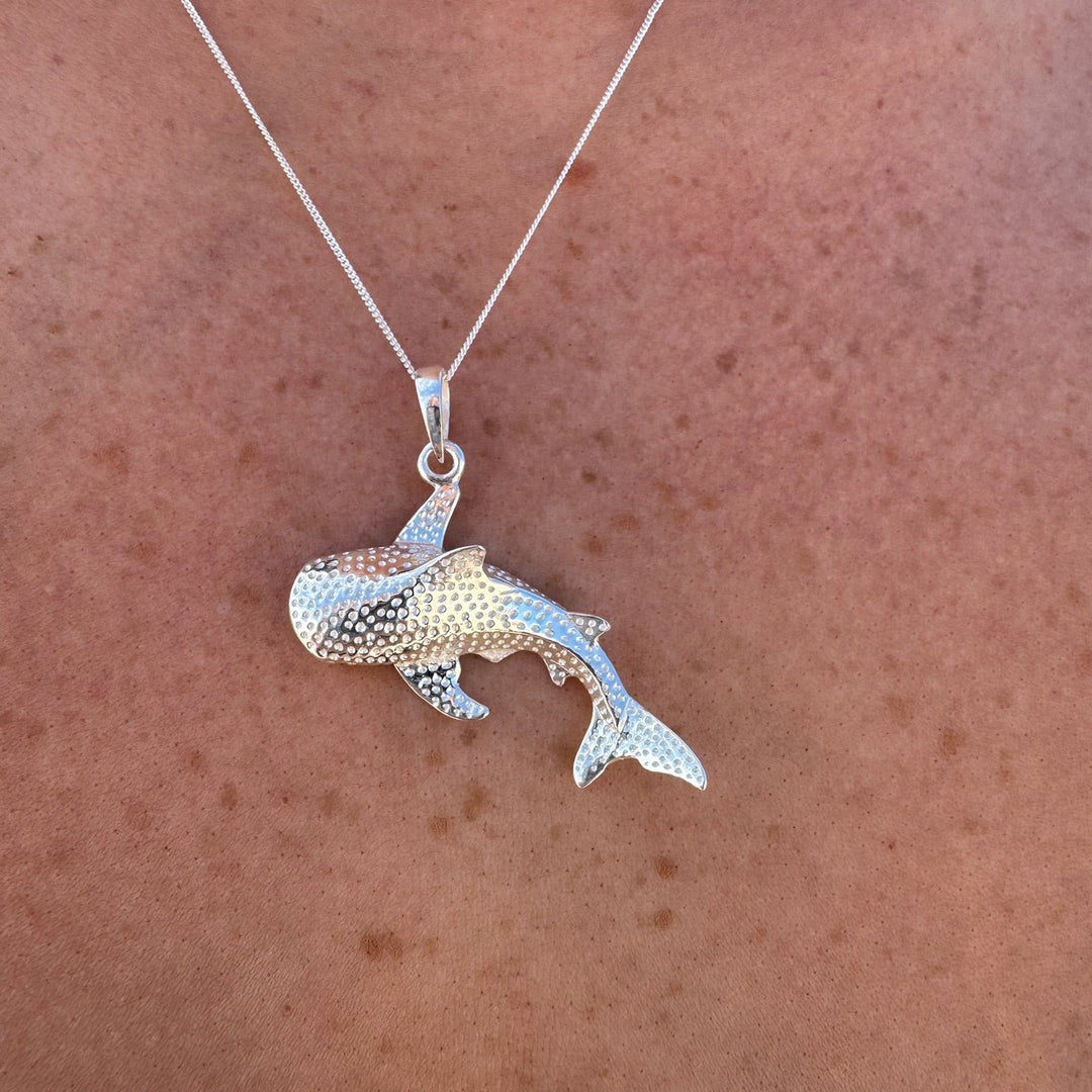 Whale shark necklace styled as everyday ocean-inspired jewellery.