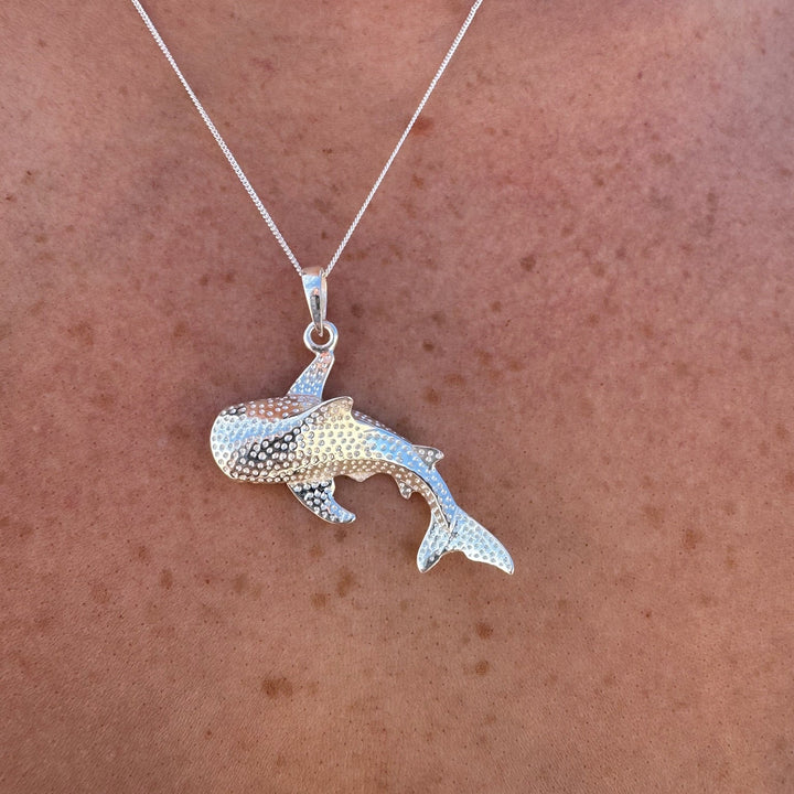 Whale shark necklace styled as everyday ocean-inspired jewellery.