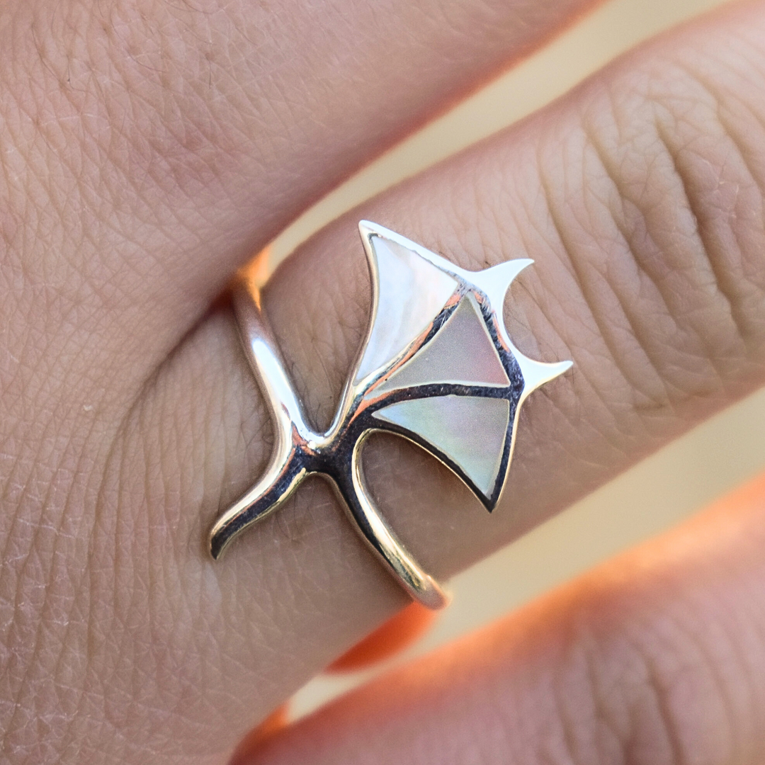 Sterling silver manta ray ring with shimmering mother of pearl stone, ocean-inspired jewellery for everyday wear.