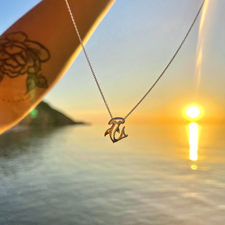 Close-up of detailed hammerhead shark pendant in sterling silver
