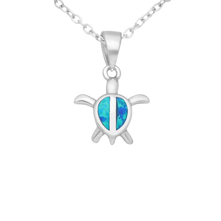 Sterling silver turtle necklace with lab-grown blue opal on white background
