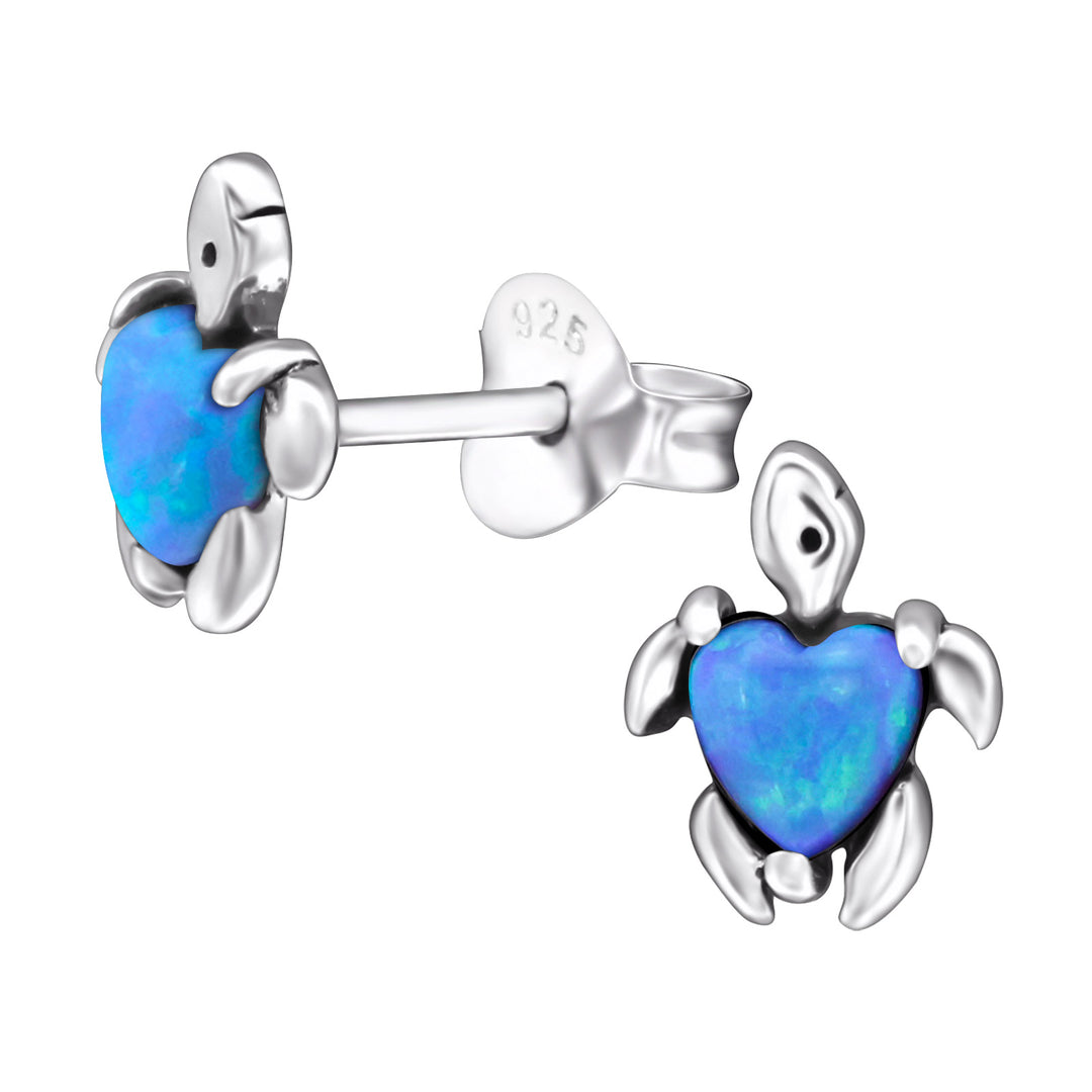 Lab-grown blue opal turtle stud earrings on white background, sterling silver ocean jewellery
