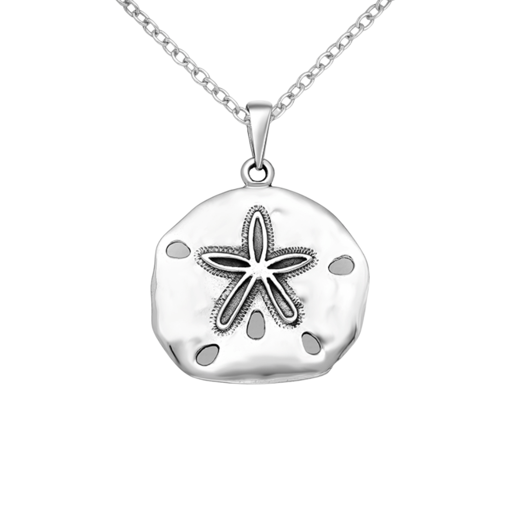 Sterling silver sand dollar necklace on white background, ocean-inspired pendant"