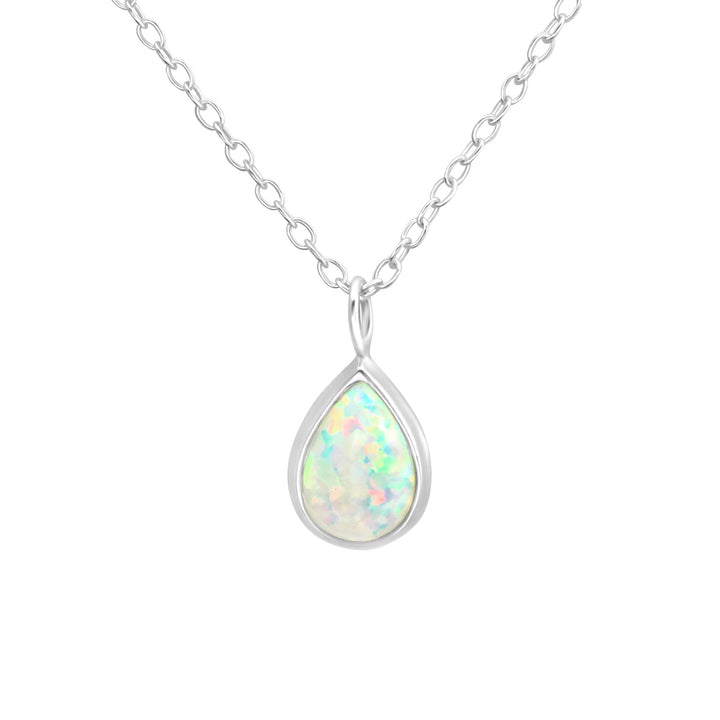 Sterling silver pear-shaped necklace with lab-grown white opal on white background